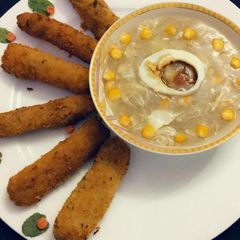 A picture of Cheese and chicken sticks.