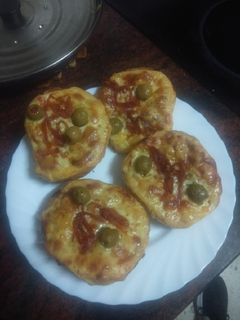 Foto principal de Panecillos estilo pizza con toque de ajillo