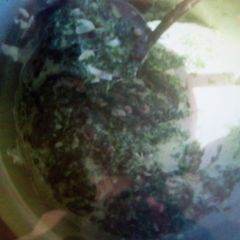 A picture of Mrenda with spinach.
