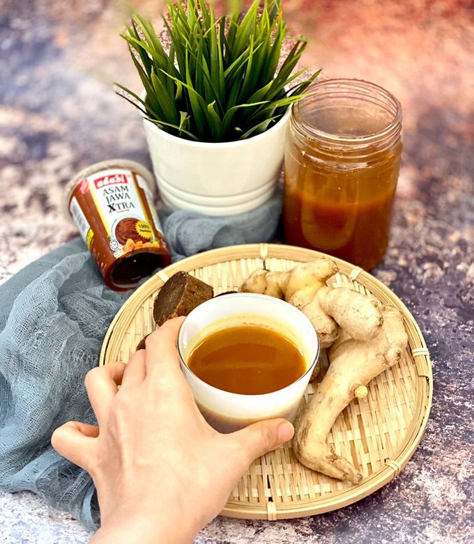 A picture of Jamu Kunyit Asam - Turmeric Tamarind Tonic Drink.