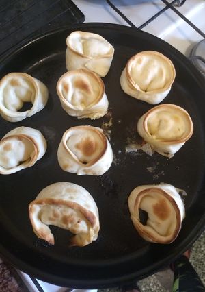 Una foto de Empanadas de cebolla, aceituna y queso
