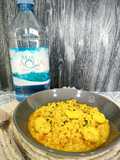 Arroz meloso con huevas de sepia y migas de coliflor