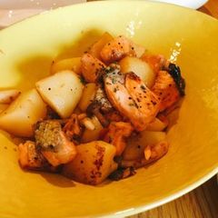 A picture of Japanese style salmon with potatoes.