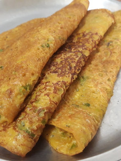A picture of Cucumber Chila / spicy pancakes.