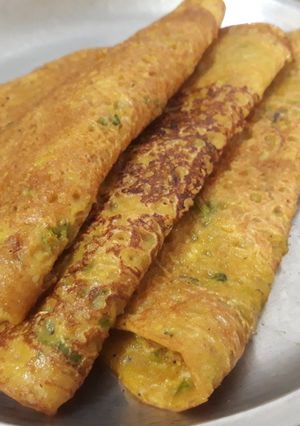 A picture of Cucumber Chila / spicy pancakes.