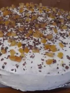 Una foto de Bizcocho de naranja con frosting de queso