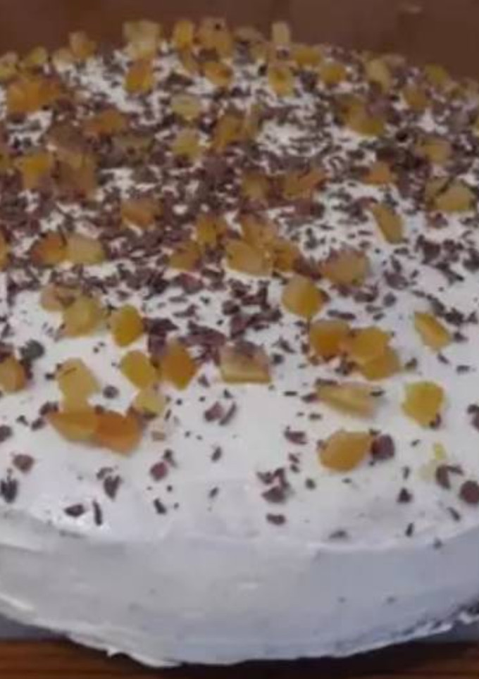 Una foto de Bizcocho de naranja con frosting de queso