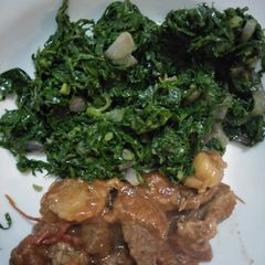 A picture of Sukuma wiki with beef.