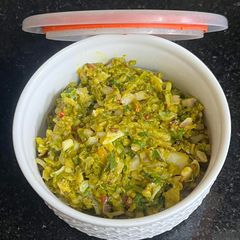A picture of Karela Chokha (A Traditional Indian Mashed Karela Dish).