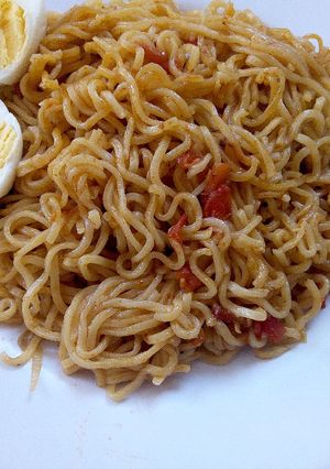 A picture of Indomie and boiled eggs for lunch.