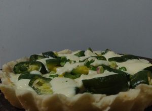 Una foto de Tartas de zapallito verde y anquito con queso