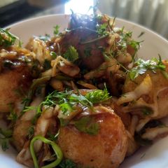 A picture of Manchurian flavoured steamed rava balls.