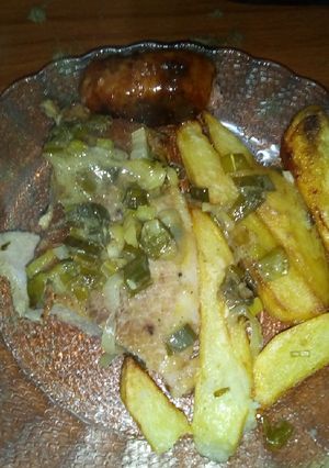 Una foto de Bife de jamón con papas al horno al verdeo
