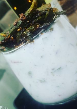 A picture of Bharwa Masala Bhindi with Vegetable Raita - Dalgona Style.