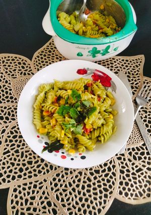 A picture of CREAMY PESTO PASTA 😋 With BASIL Leaves.
