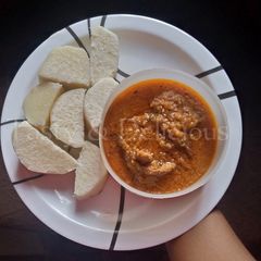 A picture of Boiled Yam and Garden Egg Stew.