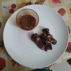 A picture of Chicken steak with pepper garlic sauce.