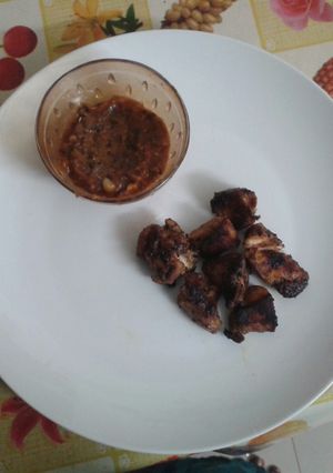 A picture of Chicken steak with pepper garlic sauce.