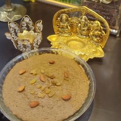 Apple,Millets,wheat almond milk with jaggery cake A picture of Apple,Millets,wheat almond milk with jaggery cake.