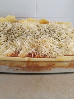 Una foto de Lasaña mixta de carne