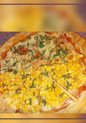 Una foto de Pizza de choclo y verdeo 💜