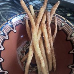 A picture of Nigerian Kokoro or cornmeal snacks.