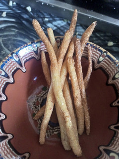 A picture of Nigerian Kokoro or cornmeal snacks.