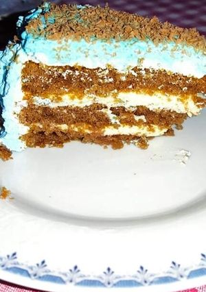 O poză a rețetei Tort cu blat de cacao și cremă de vanilie.