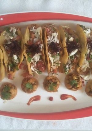A picture of Tacos with Indian taste.