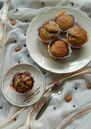 A picture of Eggless Whole Wheat Banana Muffins with Dry Fruits.