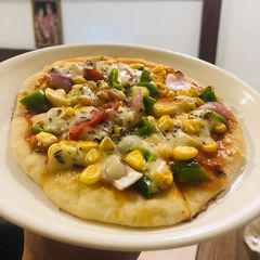 A picture of The Wok Pizza.