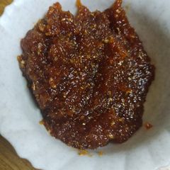 A picture of Sweet, sour and spicy amla crush.