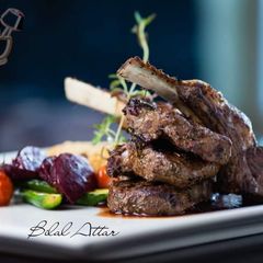 A picture of #Tripolitan_cuisine#Oven_Roasted_Lamb_Chops_and_Vegetables.
