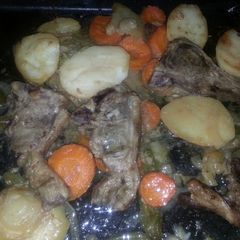 A picture of Grilled lamb with vegetables.