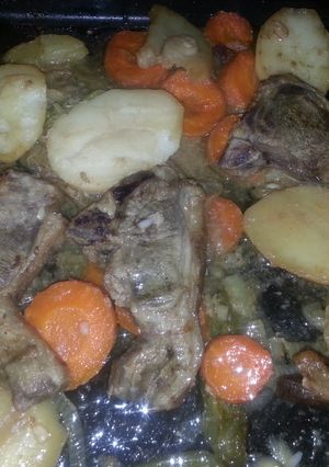 A picture of Grilled lamb with vegetables.