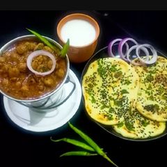 A picture of Pindi Chole kulcha.