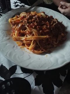 Una foto de Nidos a la boloñesa