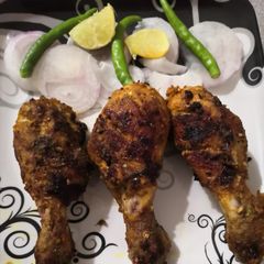 A picture of Roasted garlic masala chicken drumstick.