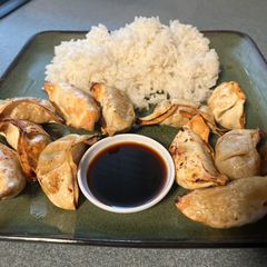 A picture of Quick lunch: frozen pot stickers & rice.