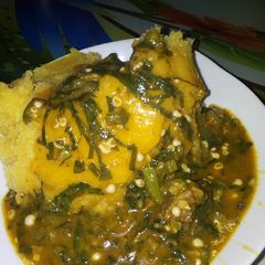 Ogbono and okro soup with Garri A picture of Ogbono and okro soup with Garri.