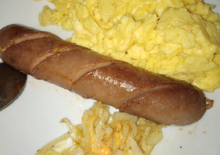 Scramble egg with sausage and saute cabbage