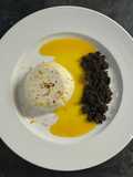 Pannacotta al peperoncino con coulis d’arancia e crumble al cacao