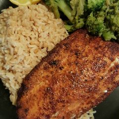 A picture of Salmon and broccoli dinner.