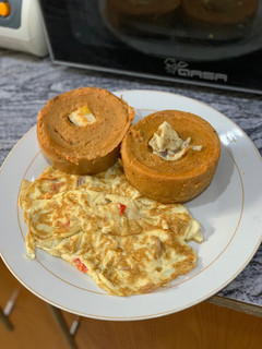 A picture of Moi moi and fried egg.