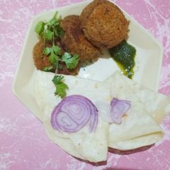 A picture of Black chana kabab and paratha.