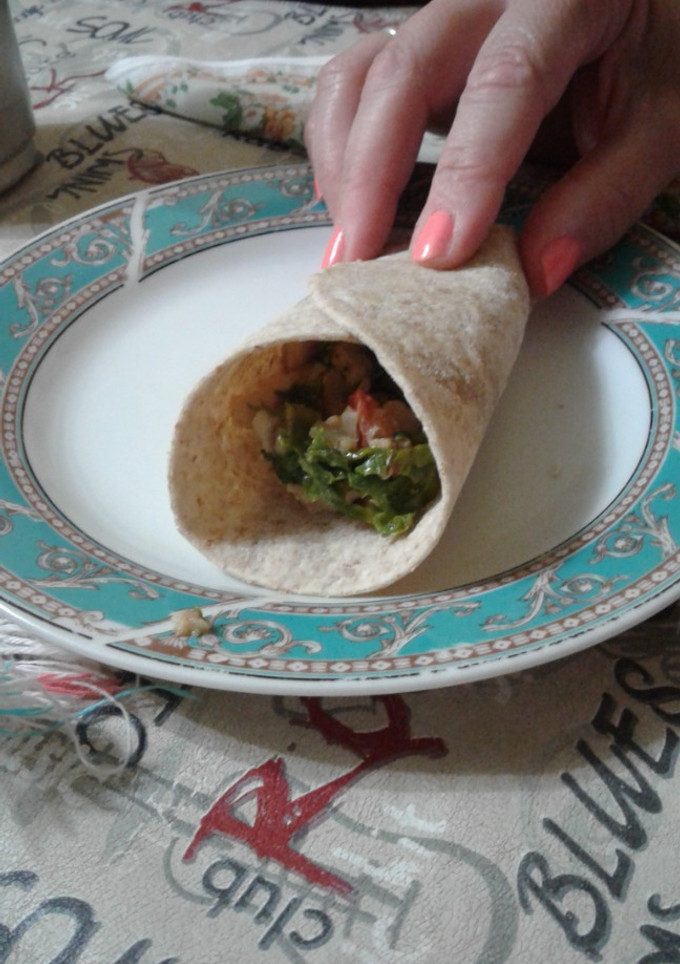 Una foto de Tacos de Pollo de Mar y Kale