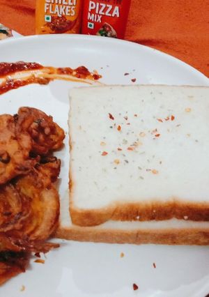 A picture of Schezwan onion fritters.