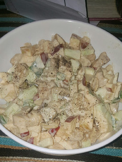 A picture of Apple, cucumber and chicken salad.