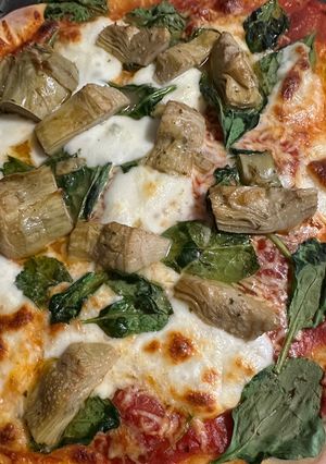 A picture of Artichoke Spinach Pizza.