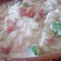 A picture of Middle Eastern salad 🥗 Tzatziki.